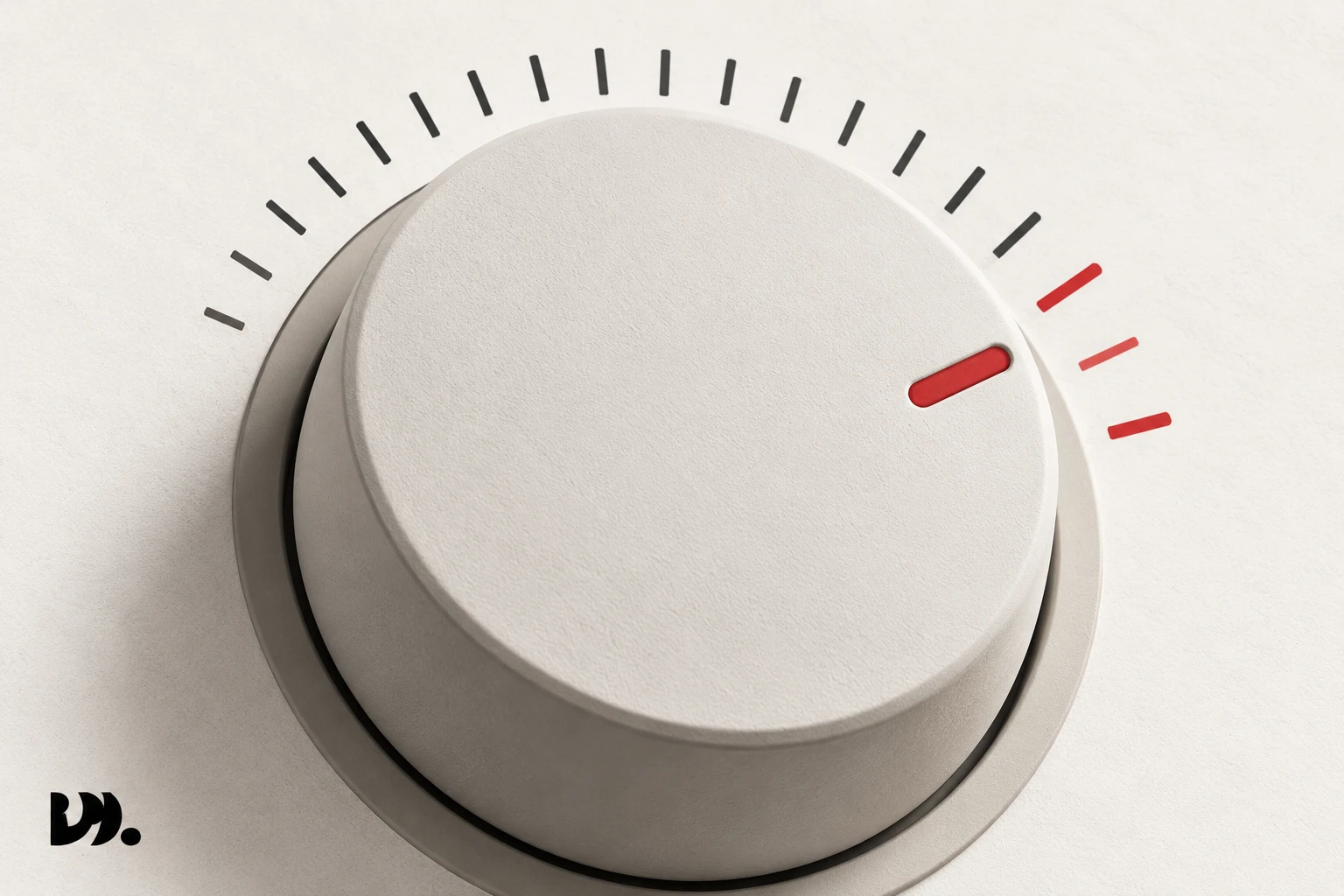 Close-up of a volume dial turned past its printed maximum into a red boosted zone